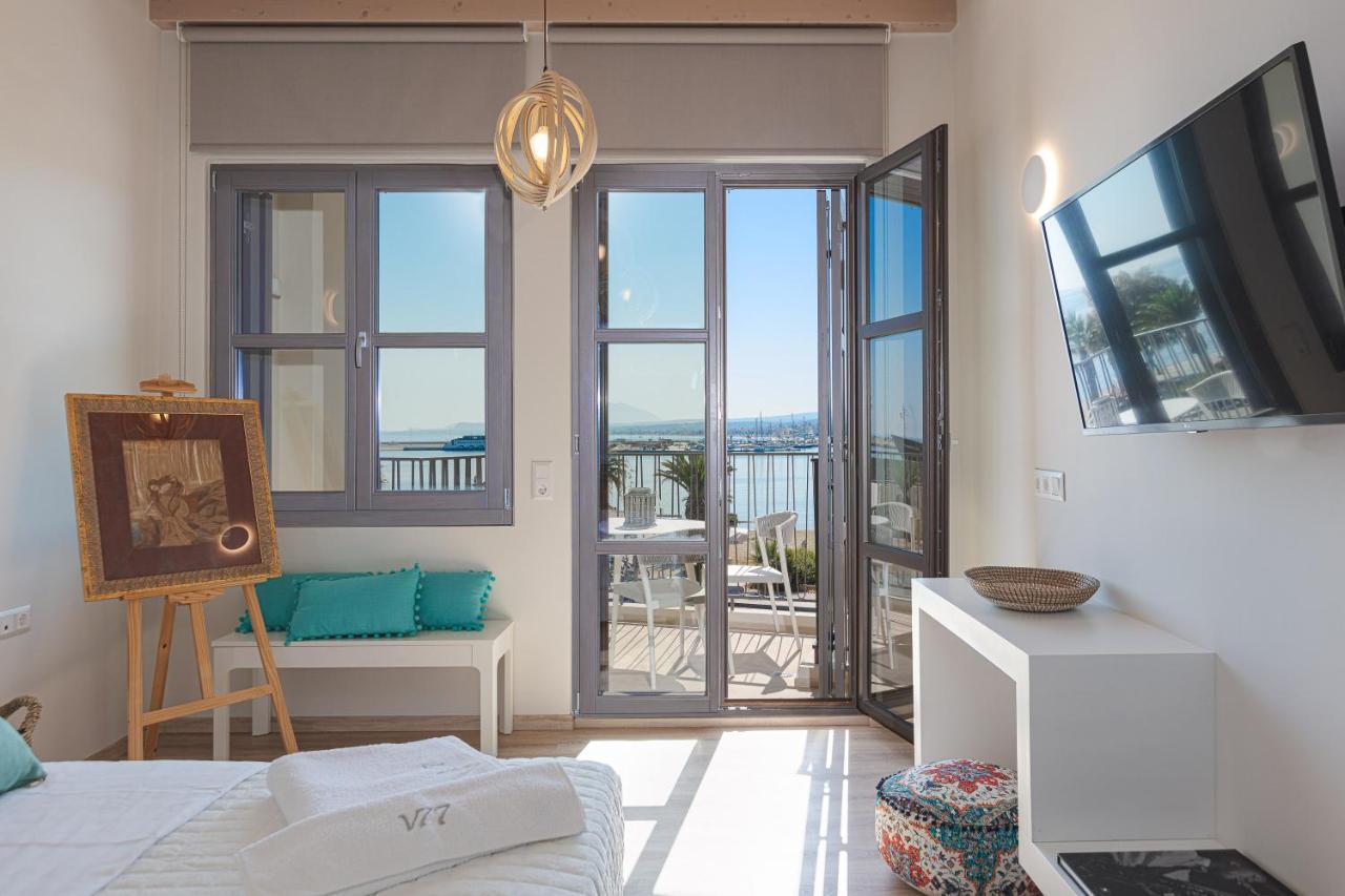 V77 Seafront Suites 罗希姆诺 外观 照片