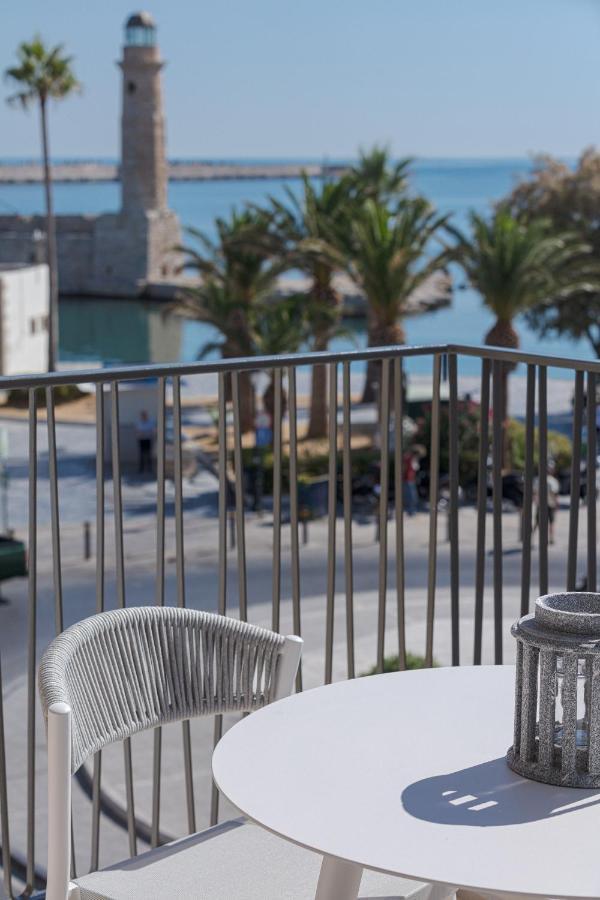 V77 Seafront Suites 罗希姆诺 外观 照片